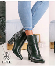 Snake leather ankle boots - green
